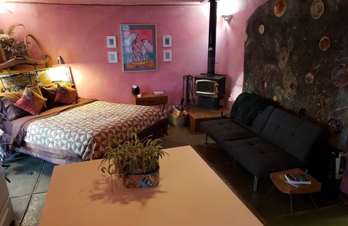 Cerrillos House | Romantic Adobe Casita, Hot tub, Kitchen, Woodstove, astounding views, historic.