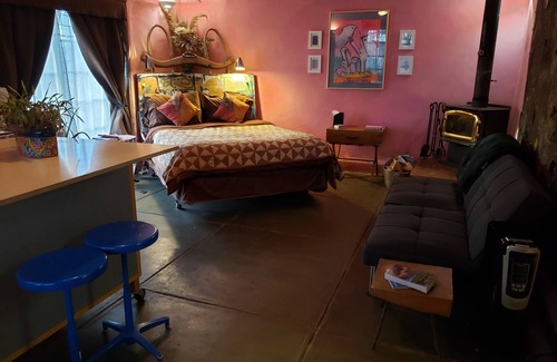 Cerrillos House | Romantic Adobe Casita, Hot tub, Kitchen, Woodstove, astounding views, historic.