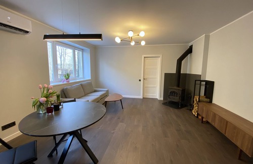 Mezaparks Apartment | Romantic apartment with wood burning stove located in green, quiet neighbourhood