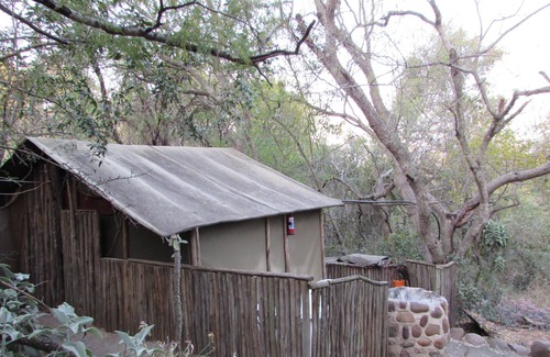 Thorny Bush Game Reserve House | Romantic canvas pad on river, share shower with monkeys and listen to the lions