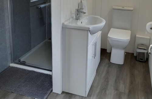 Caio Cabin | Romantic cosy railway carriage with hot tub and garden.