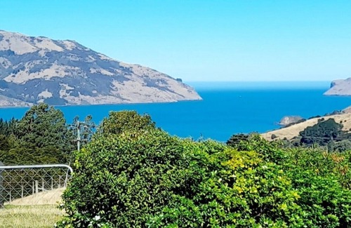 Wainui House | Romantic Getaway on Stunning Farmland - pet friendly