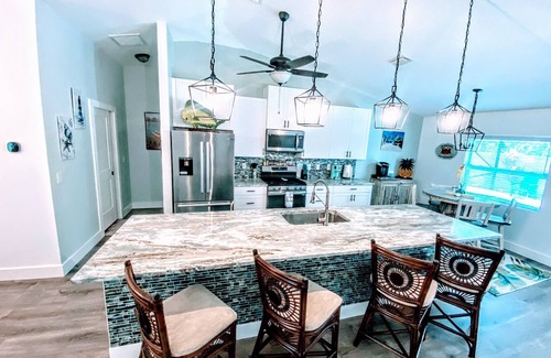 Vero Beach House | Romantic getaway! Pool home with hot tub ,Tiki Bar. Close Beaches , live music !