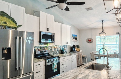 Vero Beach House | Romantic getaway! Pool home with hot tub ,Tiki Bar. Close Beaches , live music !