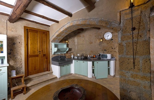 Civita di Bagnoregio Apartment | Romantic home carved into the rock with breathtaking views
