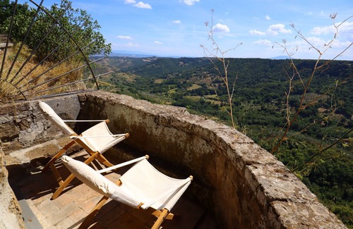 Civita di Bagnoregio Apartment | Romantic home carved into the rock with breathtaking views