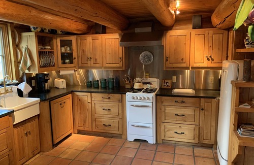 June Lake Cabin | Romantic log cabin getaway with spectacular mountain views.nSTR AP 18-005