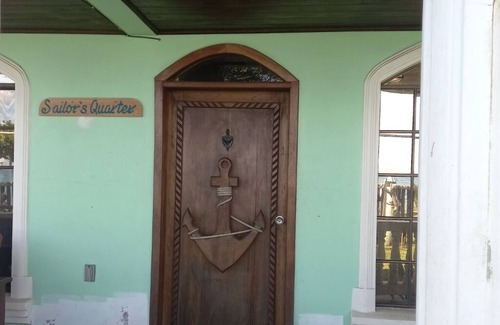 Corn Island House | Romantic one bedroom furnished apartment steps away from the Caribbean Ocean.