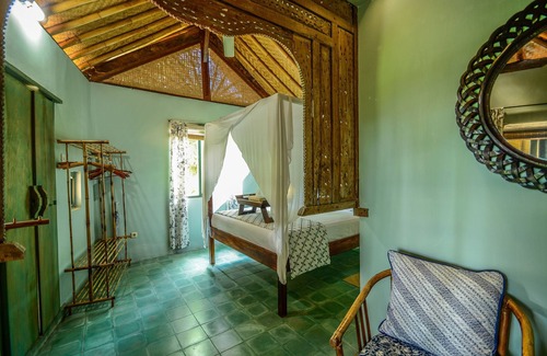 Jasri Resort | Romantic Private Villa facing the pool.Soft aqua handmade tiles and antiques.