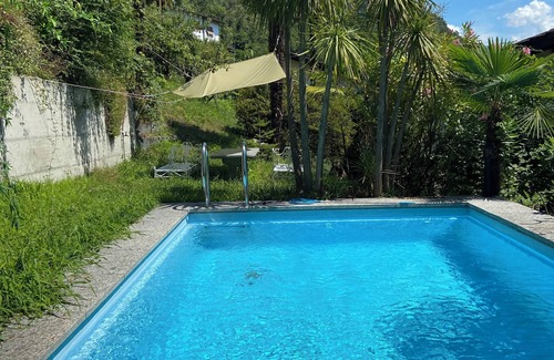 Riazzino Apartment | Romantic retreat with swimming pool.