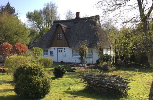 Rehm-Flehde-Bargen House | romantic thatched roof house with large garden