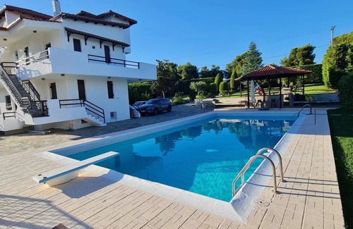 Oropos Villa | Romantic traditional Villa with huge garden, swimming pool, basketball court etc