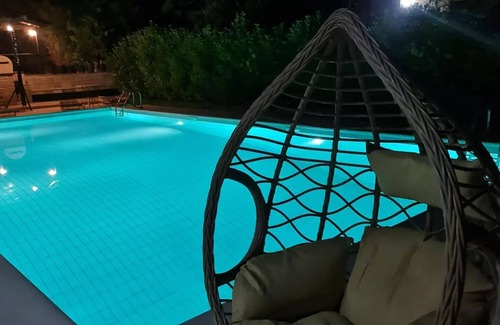 Oropos Villa | Romantic traditional Villa with huge garden, swimming pool, basketball court etc