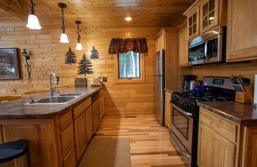 Wetmore Cabin | Romantic Upscale Cabin on Rustic Lake, A/C! 25 miles to Pic Rocks!