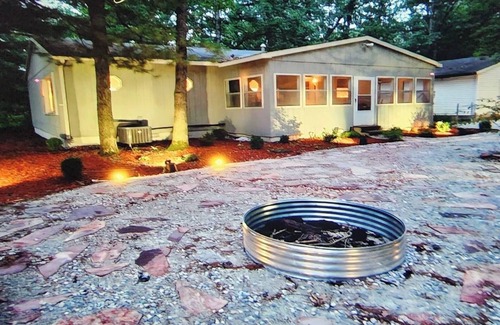 Bitely Cottage | Romantic woodland cottage vacation rental in Baldwin. Pet friendly!