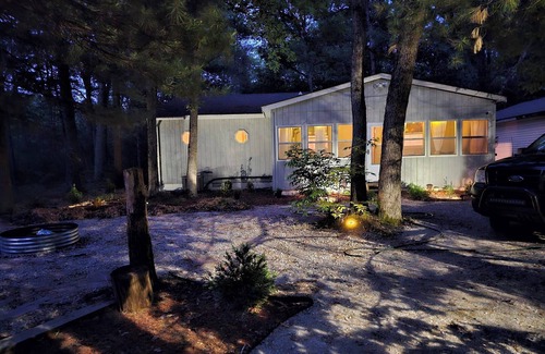 Bitely Cottage | Romantic woodland cottage vacation rental in Baldwin. Pet friendly!