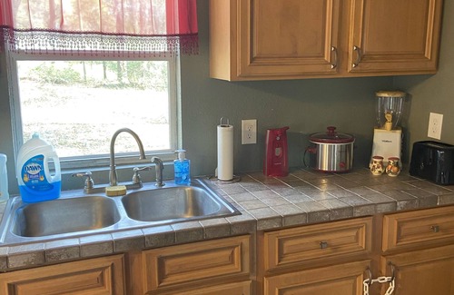 Pinetta Cottage | ROOF DAMAGE FROM HURRICANE Florida Waterfront Home, Fishing & Pet Friendly