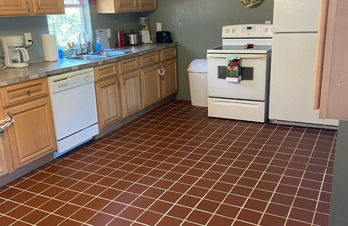 Pinetta Cottage | ROOF DAMAGE FROM HURRICANE Florida Waterfront Home, Fishing & Pet Friendly