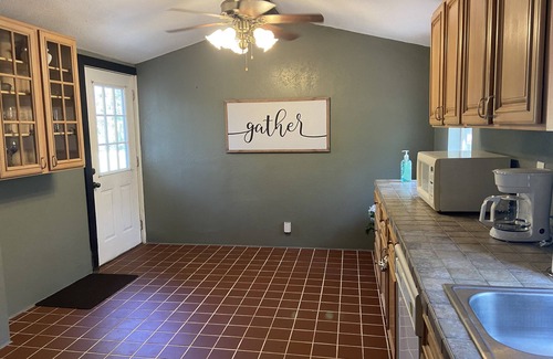Pinetta Cottage | ROOF DAMAGE FROM HURRICANE Florida Waterfront Home, Fishing & Pet Friendly