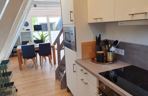Carolinensiel House | Roof-only house "Murmel 4", charging station f. Electric cars, fireplace, beach chair, WLAN