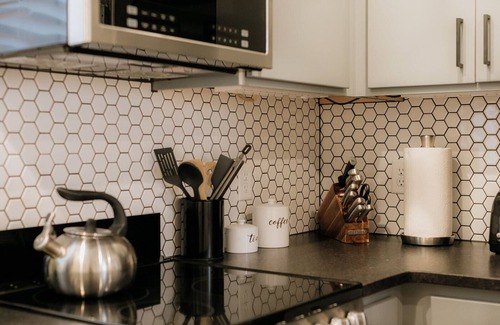 Northside Condo | Rooftop deck condo - hot tub/fire pit - walking distance to downtown!