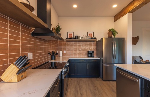 New Plymouth House | Rooftop deck with AMAZING Views, Fire table, Bar, Hot tub and Pet Friendly!