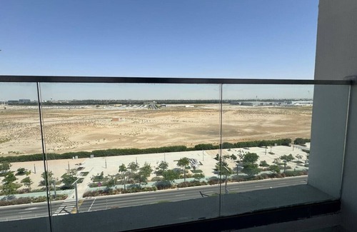 Masdar City Apartment | Rooftop Luxury: 2BR Haven with Jacuzzi & Views