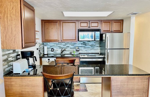 Vanderbilt Beach Condo | ROOFTOP POOL & STEPS TO VANDERBILT BEACH!