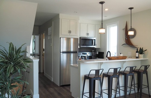 Traverse City Condo | Rooftop Views of West Bay & Downtown! Fantastic condo just steps away from beach