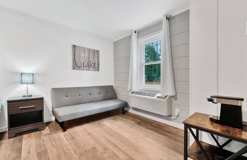 Houghton Lake Hotel | Room #1: Updated King Suite w/small couch