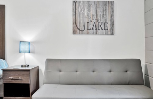 Houghton Lake Hotel | Room #10: Updated King Suite w/small couch
