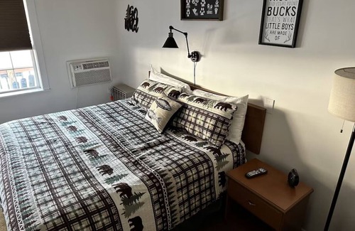 Schroon Lake Hotel | Room 104 king bed .