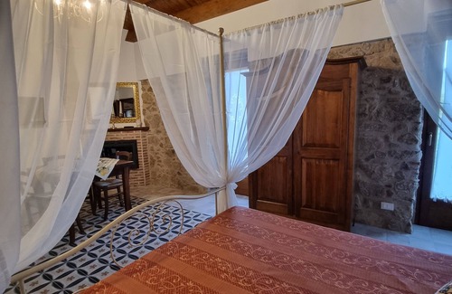 Sant'Angelo di Brolo House | Room 'Arcaloro - Resort Rooms Infinito' with Sea View, Wi-Fi and Air Conditioning