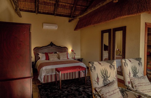 Mookgopong House | Room in Guest Room - Mmakuba Private Game Lodge, Deluxe Chalet 9A