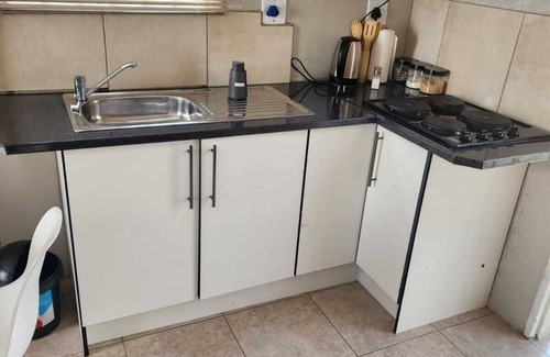 Govan Mbeki House | Room-khutsong Apartmentss