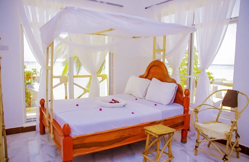 Nungwi Bed & Breakfast | Room Ns beach front sea view 3rdlat 2-4 gust
