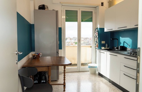 Quartiere XXIII Alessandrino House | Room with private bathroom in penthouse