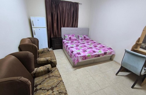 Al Qasimia House | Rooms opposite mega mall in telephone shops roundabout flat no 203