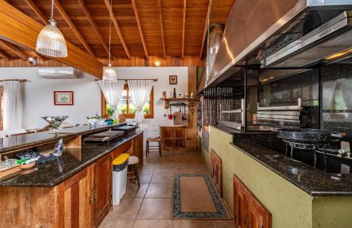 Carniel House | Rosa Casa Sereno 5 suítes