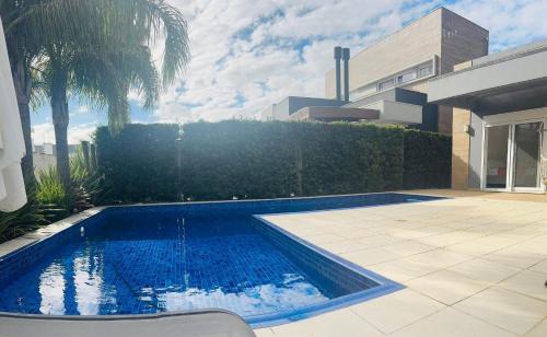 Xangri-La House | Rosa Condomínio Enseada lagos de Xangri-lá