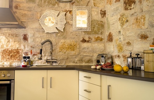 Evgiros Villa | Rose Tower Luxury stone tower villa in the middle of nature with stunning view.
