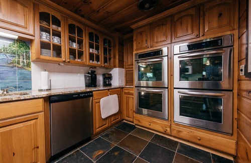 Grayling Cabin | 🦌 Royal Stag Lodge – Au Sable Riverfront | Near Garland, Grayling | Game Room | Pet-Friendly