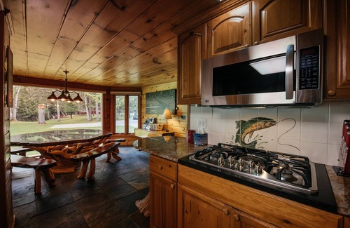 Grayling Cabin | 🦌 Royal Stag Lodge – Au Sable Riverfront | Near Garland, Grayling | Game Room | Pet-Friendly