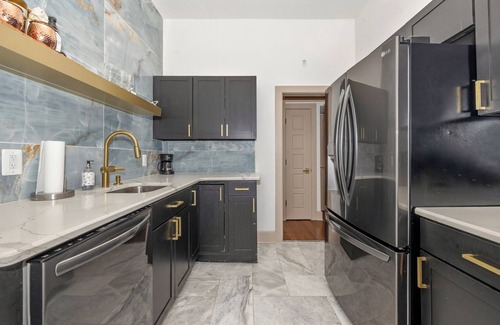Frederick Apartment | Royalty on the Park: bar, movie theater, & patio