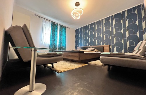 Mainz-Bingen Apartment | Rumble in the Jungle with event space in a former winery