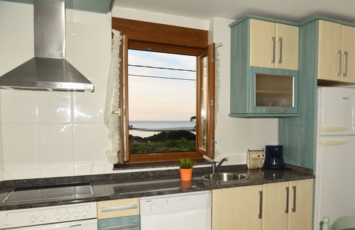 Mogro Apartment | Rural apartment facing the beach with swimming pool and paddle tennis court.