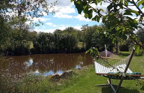 Parsac House | rural cottage with garden overlooking the swimming pond