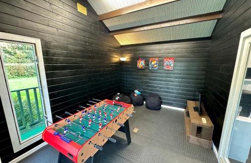 Marsh Lane House | Rural Retreat with Hot Tub, Fire Pit & Games Room