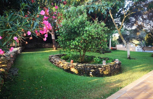 Sant Francesc Xavier House | Rustic villa with large infinity pool and lawn