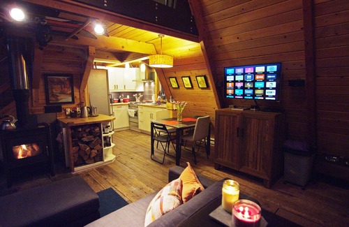 Glacier Cabin | Rustic 70's A-Frame with a cozy modern interior.